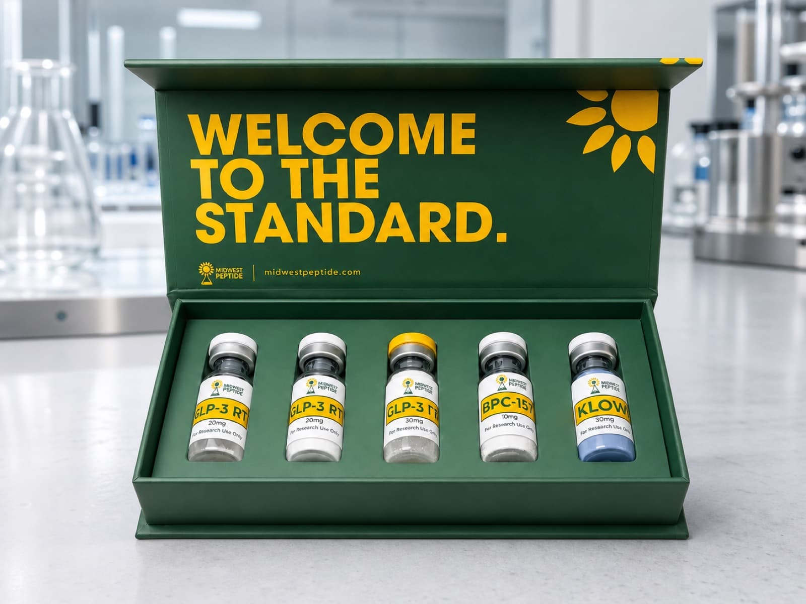 A Midwest Peptide box holding five research compound vials